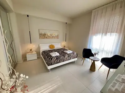 Letto o letti in una camera di Salotto Santa Franca