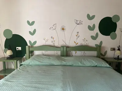 Letto o letti in una camera di La Stornaia