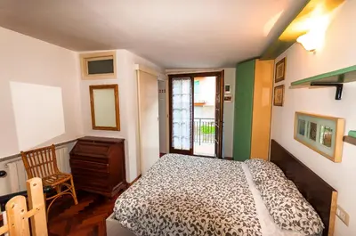 Letto o letti in una camera di Il Tiglio