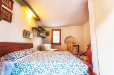 Letto o letti in una camera di Il Tiglio