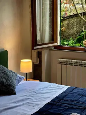 Letto o letti in una camera di Mare di Luna - AC - WiFi - Garden - 2 Parking Spaces