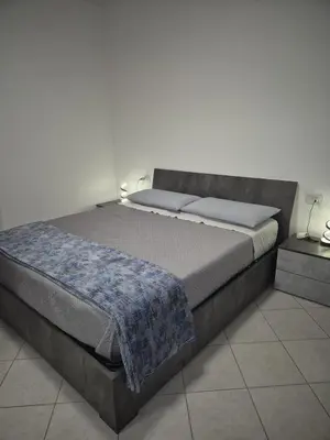 Letto o letti in una camera di Confortevole alloggio