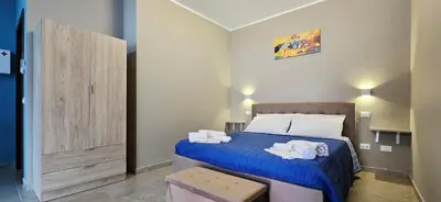 Letto o letti in una camera di Guest Holiday Gambara 1 e 2