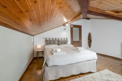 Letto o letti in una camera di La Mansarda del Borgo