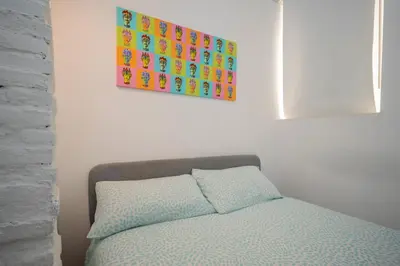 Letto o letti in una camera di Paloma