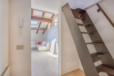 Letto o letti in una camera di Respiro di Ghirlandina - Rua Frati 34 Palace by MoVeBNB