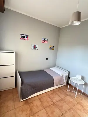 Letto o letti in una camera di PIT STOP BeB
