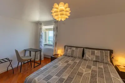 Letto o letti in una camera di Cava Ardè Rooms