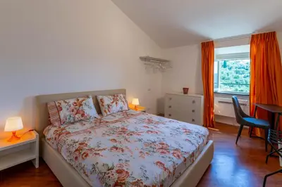 Letto o letti in una camera di Cava Ardè Rooms