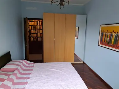 Letto o letti in una camera di Book Paradise