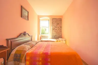 Letto o letti in una camera di Relax Brugnato