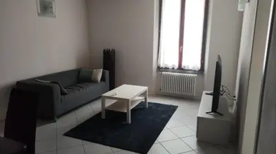 Area soggiorno di Room Santo Stefano