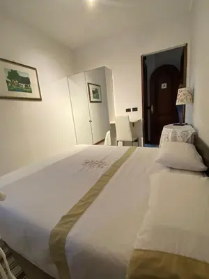 Letto o letti in una camera di L'angolo di Chiavari