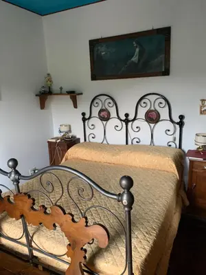 Letto o letti in una camera di La Casa dei Nonni