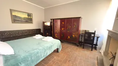Letto o letti in una camera di Corte Onorata - Manu Maison