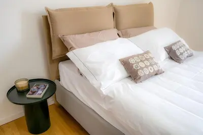 Letto o letti in una camera di Emilia Suite Garden