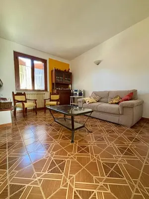 Area soggiorno di Casa Vacanza Ginevra