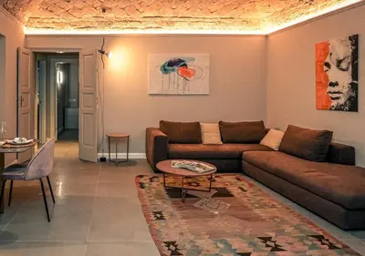 Area soggiorno di Heart of Piacenza Luxury Apt, 100m Piazza Cavalli