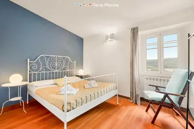 Letto o letti in una camera di Corte del Poeta, TerreMarine