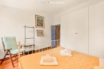 Letto o letti in una camera di Corte del Poeta, TerreMarine