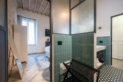 Letto o letti in una camera di GuestHost - Bixio 29 Apartments 3 and 5