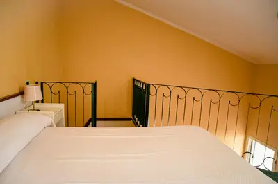 Letto o letti in una camera di Hotel San Genesio