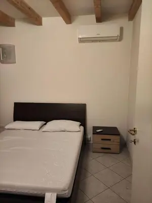 Letto o letti in una camera di Large apartment with 2 bedrooms in the historic center