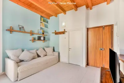 Letto o letti in una camera di Timeless, Terre Marine
