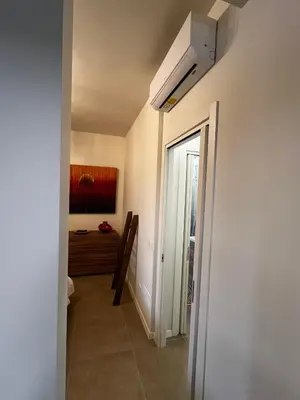 Letto o letti in una camera di Casa Luna