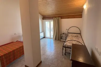 Letto o letti in una camera di Agriturismo Cascina Mezzulli