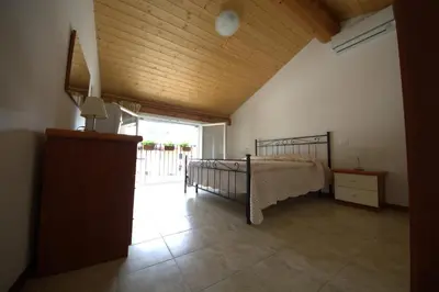 Letto o letti in una camera di Agriturismo Cascina Mezzulli