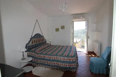 Letto o letti in una camera di Five Lands Pink Cottage