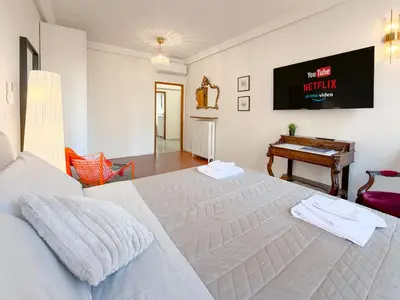 Letto o letti in una camera di Attico d'Autore in Piazza con Vista Ghirlandina