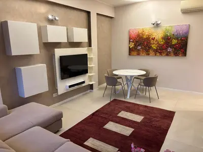 TV o dispositivi per l'intrattenimento presso Holiday Home Parma