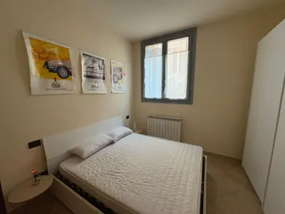 Letto o letti in una camera di Bed to the Future Parma
