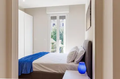 Letto o letti in una camera di Casa Valentina - WiFi Train Station Parking