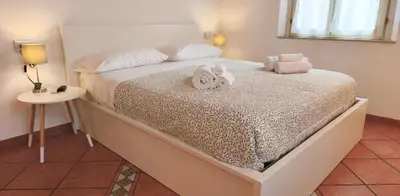 Letto o letti in una camera di Monolocale Modena con Parcheggio riservato pressi Clinica Fogliani e Centro Storico