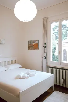 Letto o letti in una camera di SM Hospitality MONTE PASUBIO