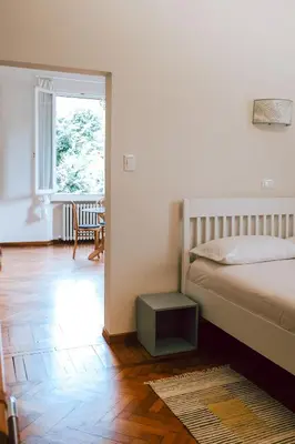 Letto o letti in una camera di SM Hospitality MONTE PASUBIO
