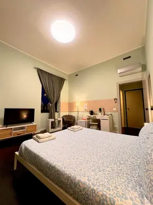 Letto o letti in una camera di The Central Rock Inn camere con bagno privato