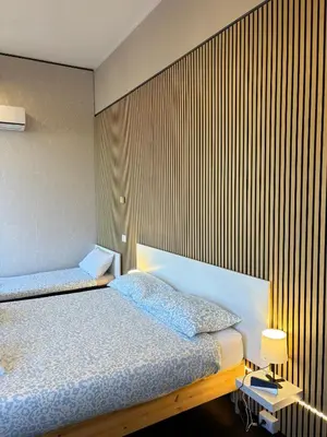 Letto o letti in una camera di The Central Rock Inn camere con bagno privato