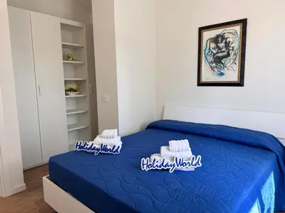Letto o letti in una camera di Oltre il Mare by Holiday World