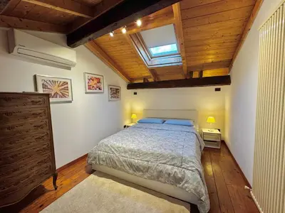 Letto o letti in una camera di CASA BOSSA - Centro storico a 1 minuto dal mare