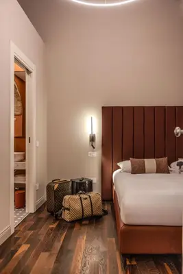 Letto o letti in una camera di La Maison de Ville & Suite