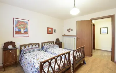 Letto o letti in una camera di Cozy Home In Pozzol Groppo With Wifi