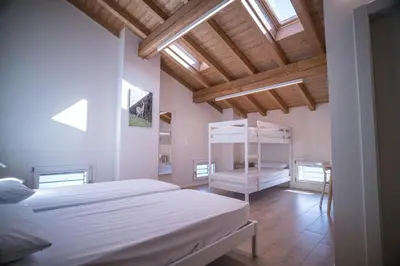 Letto o letti in una camera di Casa per ferie Cà Monte - Borzano di Albinea