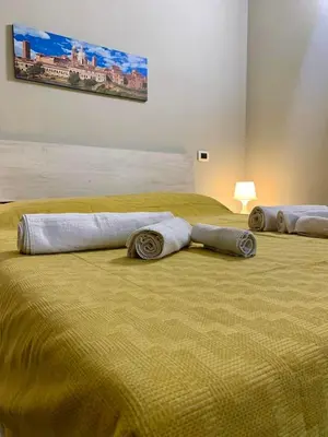 Letto o letti in una camera di La Casa di Katia
