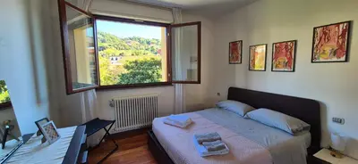 Letto o letti in una camera di Casa Bi'