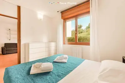 Letto o letti in una camera di LunaMare, Terre Marine