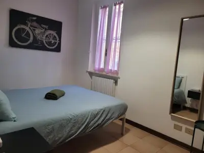 Letto o letti in una camera di Da Sergio appartamento intero